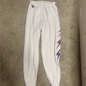 Aviator Nation White Sweatpants with Pink and Purple Bolts